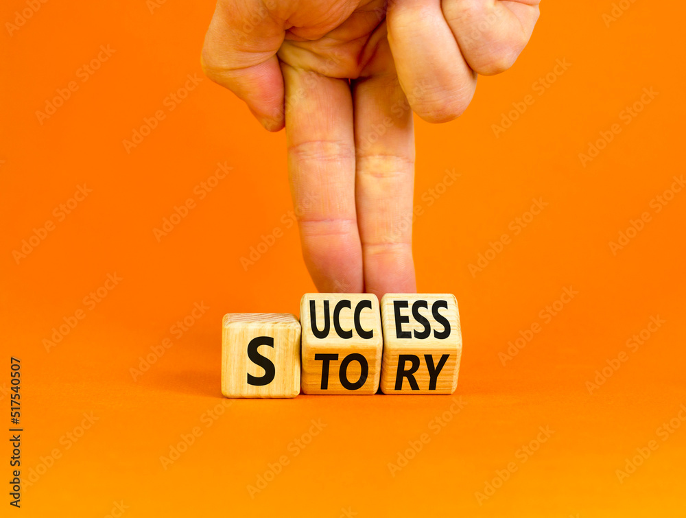 Success story symbol. Concept words Success story on wooden cubes. Businessman hand. Beautiful orange table orange background. Business and Success story concept. Copy space. - obrazy, fototapety, plakaty 