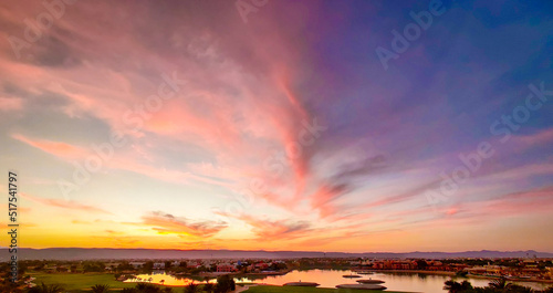 The Colorful Sky at Sunset - Showing the amazing colors of the sky at the sunset of pink, purple, pink, red & orange in Gouna, Egypt