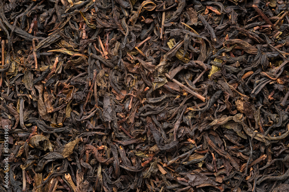 Dried tea leaves for background.low grade and inexpensive price.Top view