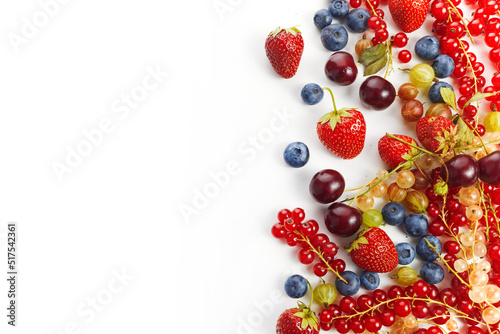 Various fresh summer berries frame on white background. Top view