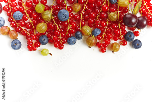 Various fresh summer berries frame on white background. Top view