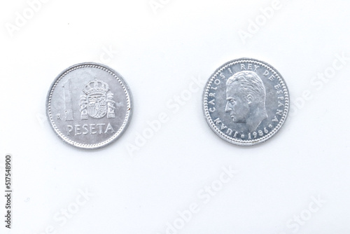 one peseta spanish old coins on white background photo