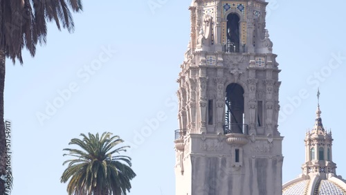 Spanish colonial revival architecture in Balboa Park, San Diego, California USA. Historic building, classic baroque or rococo romance style. Bell tower or belfry, relief stucco ornamental art decor. photo