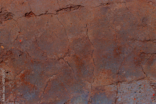 Multicolored rusty texture of the wall for background.