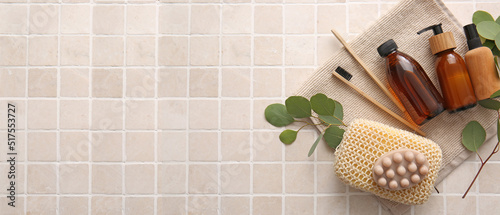 Set of bath accessories on beige background with space for text © Pixel-Shot