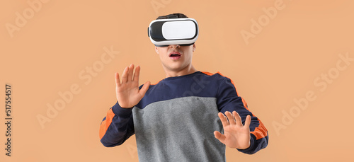 Young man with virtual real...
