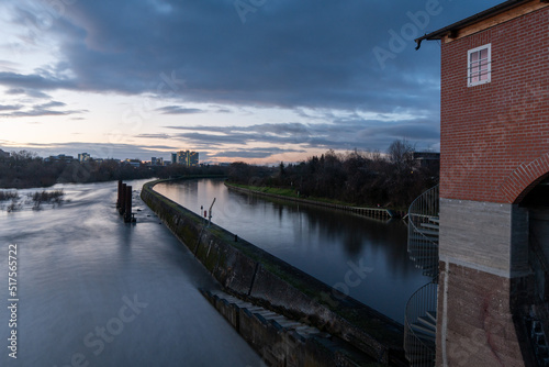 View at Neckar at dawn from Wehrsteg in Heidelbeg, Germany photo