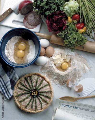 ingredients for baking, Quiche French tart consisting of pastry crust filled with cheese and vegetables