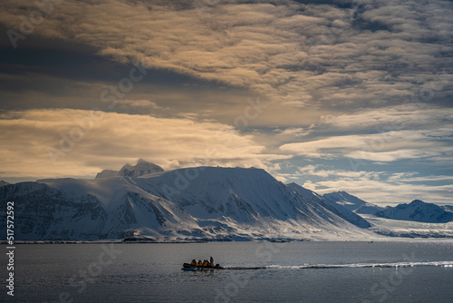 Canvas Print 2022-07-16 A SMALL ZODIAC MOTORING IN FRONT OF A SNOW COVERED MOUNTAIN RANGE NEA