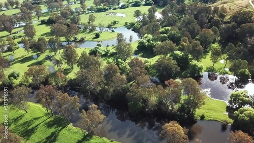 Aerial view looking down over billabongs on the Mitta Mitta River floodplain at Pigs Point near Tallangatta South, in north-east Victoria, Australia. November 2021. photo