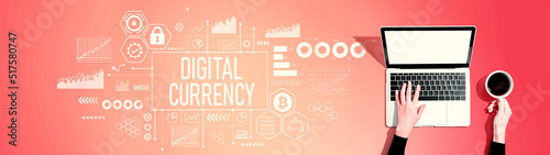 Digital currency theme with person using a laptop