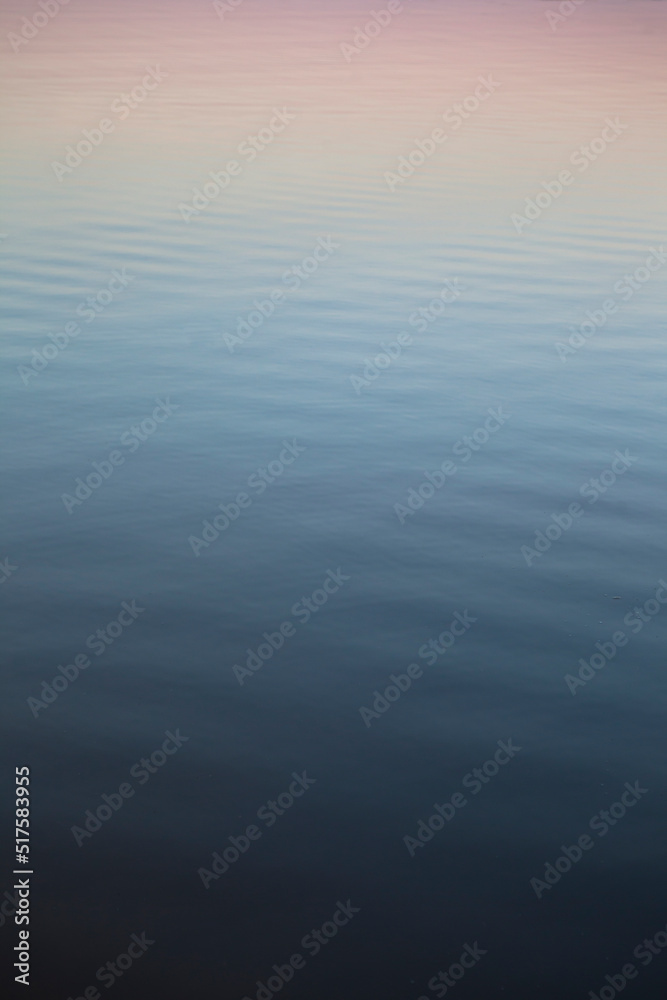 Colors of Dawn and Dusk Reflected on Surface of Water