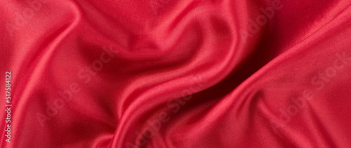 abstract luxury red silk fabric cloth or liquid wave or texture satin background