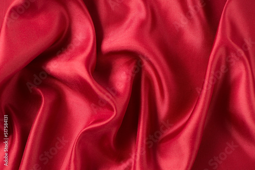 abstract luxury red silk fabric cloth or liquid wave or texture satin background