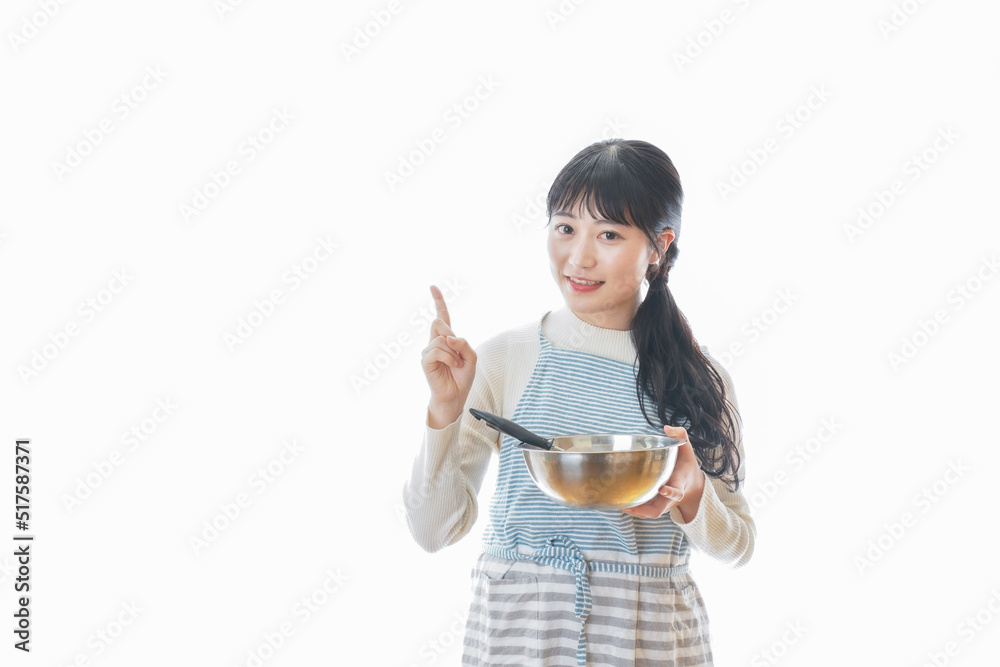クッキング教室に通う若い女性 クッキング教室に通う若い女性
