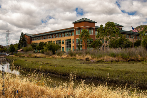 781 Lincoln Avenue in San Rafael, CA is bordered by an urban stream that slows to the San Francisco Bay.   photo