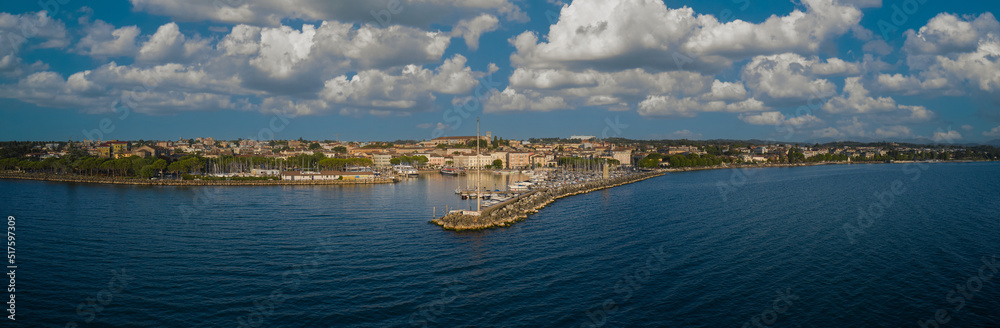 Panorama of the city of Desenzano del Garda on Lake Garda in Italy. Morning city Desenzano del Garda aerial view. Panorama of the city of Desenzano del Garda on Lake Garda in Italy. Morning city Desenzano del Garda aerial view.