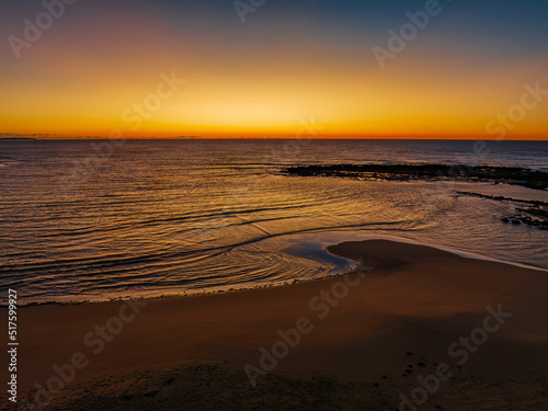 Aerial sunrise seascape with  clear skies