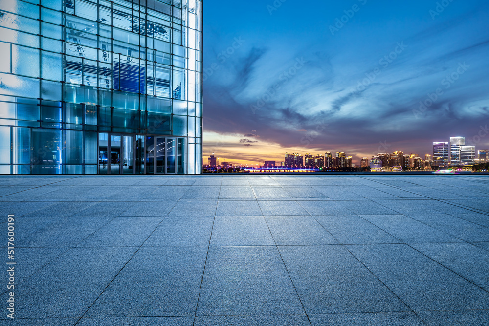 Empty floor and modern city skyline with building scenery at sunset in Suzhou, China. high angle view.