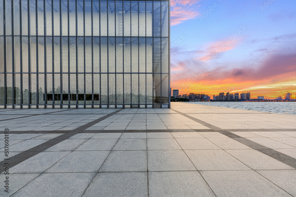 Empty floor and modern city skyline with building at sunset in Suzhou, China. 