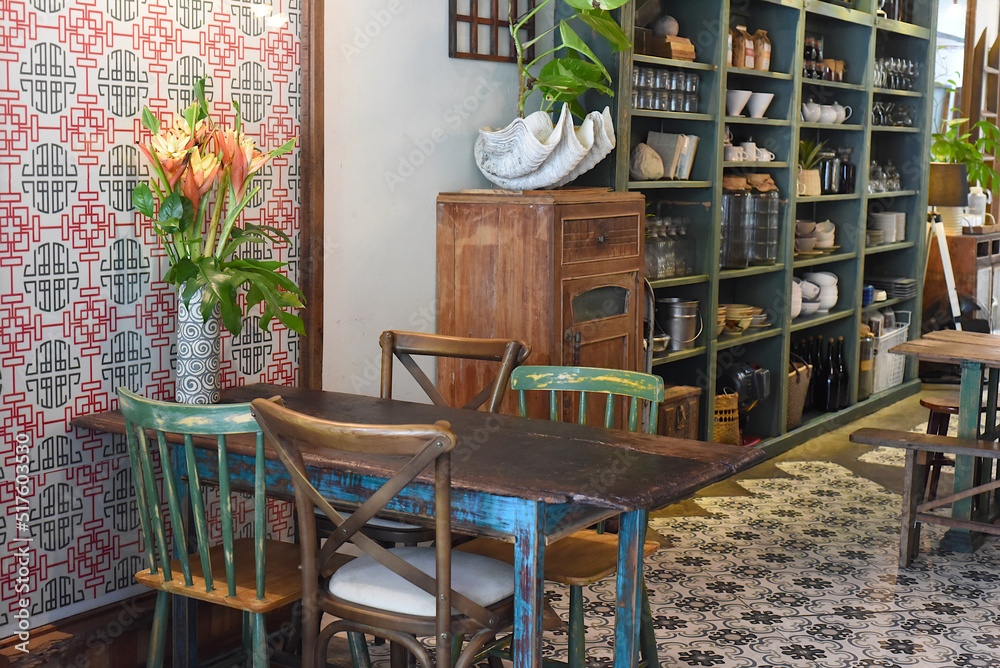 Loft style with wooden furniture in a Vietnamese coffee shop 