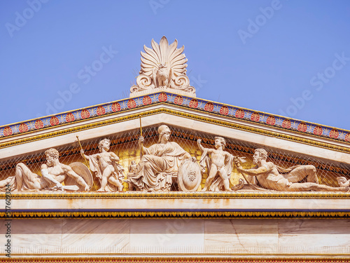 The east gable of the building of the National University of Athens, Greece. Athena, the goddess of wisdom and knowledge, sits on her throne with demigods and minor deities around her and an owl.