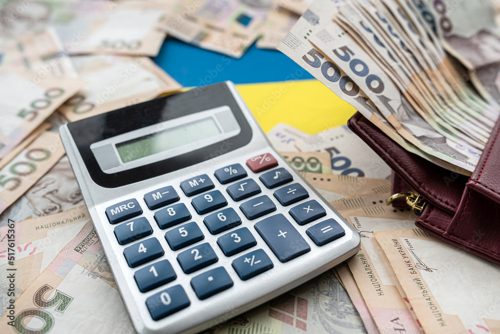 Ukrainian hryvnias bills with purse calculator. Money of Ukraine. Ukrainian hryvnias bills with purse calculator. Money of Ukraine.