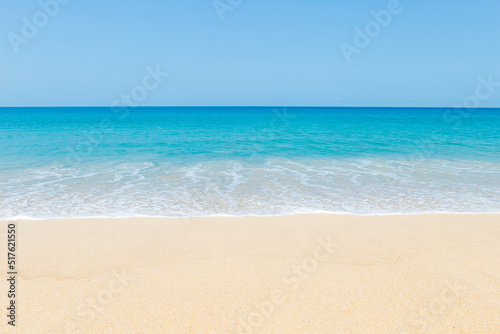 Fine sandy beach with clear blue sky background  tropical island beach in south of Thailand  tropical environment