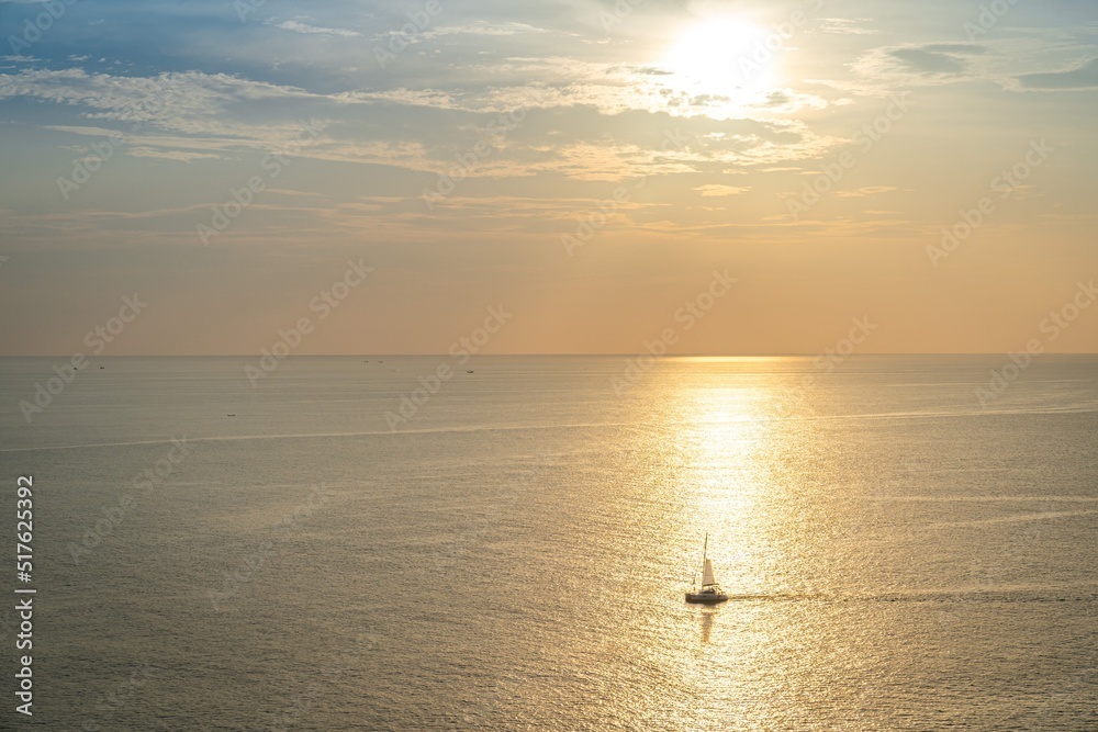Boat on the andaman sea at sunset in Phuket, south of Thailand