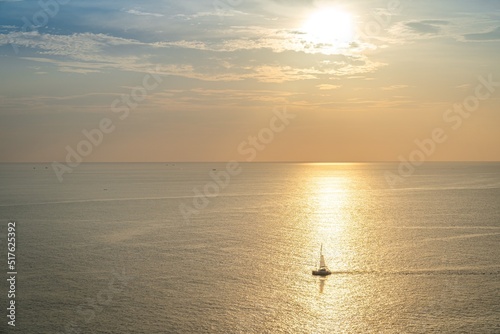 Boat on the andaman sea at sunset in Phuket, south of Thailand © inookphoto