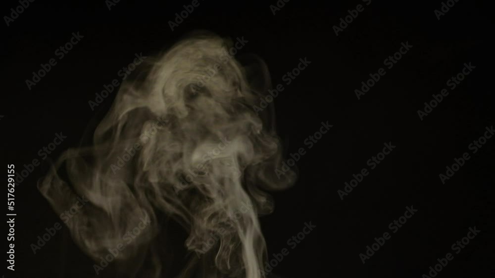 White smoke, fog, mist, vapor on a black background. White smoke, fog, mist, vapor on a black background.