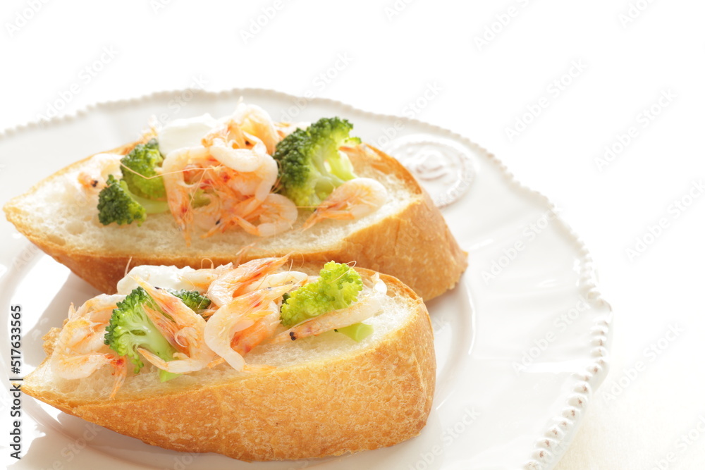 Japanese 'Sakura Ebi' boiled shrimp and broccoli with cream cheese on French bread Japanese 'Sakura Ebi' boiled shrimp and broccoli with cream cheese on French bread