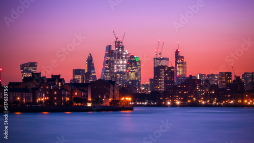 Panorama view of illuminated London cityscape at night, financial district photo