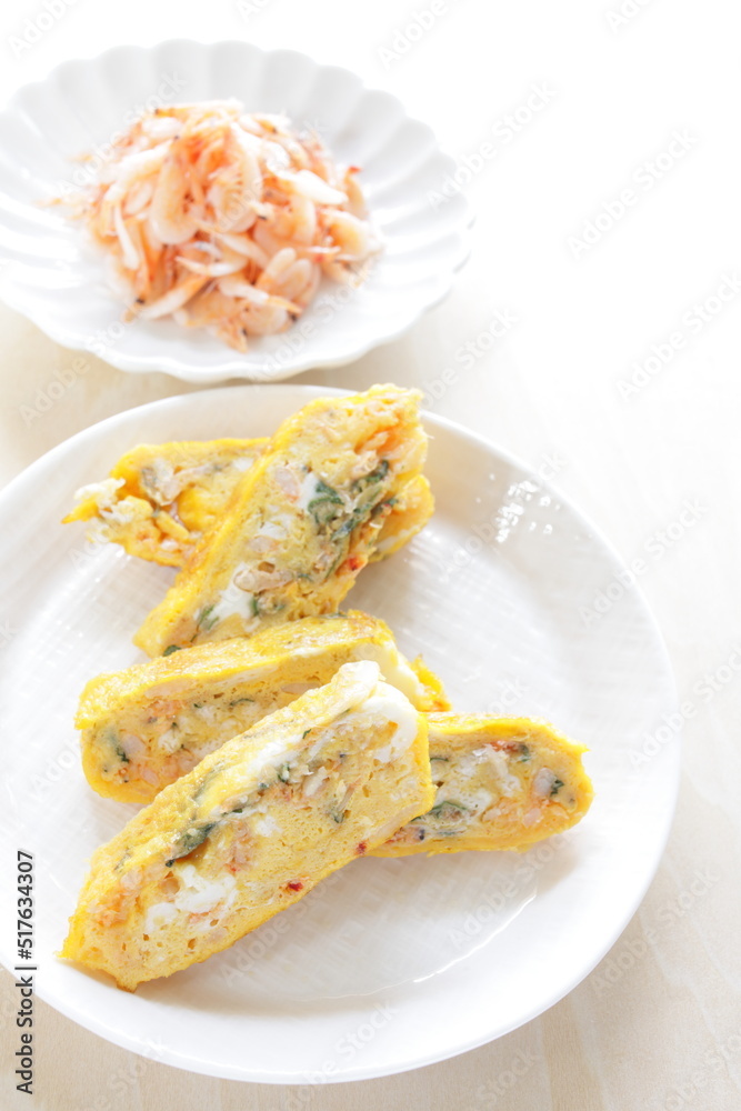 Japanese boiled shrimps and herbal Shiso in fried egg roll Japanese boiled shrimps and herbal Shiso in fried egg roll
