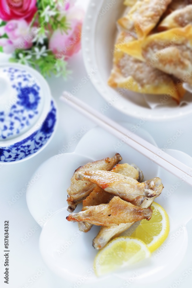 Chinese food, grilled chicken wings and tea