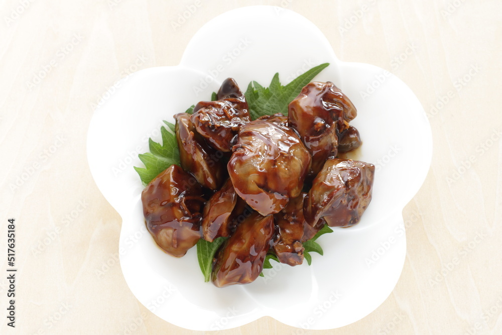 Chinese food, braised chicken livers on white dish for comfort food image Chinese food, braised chicken livers on white dish for comfort food image