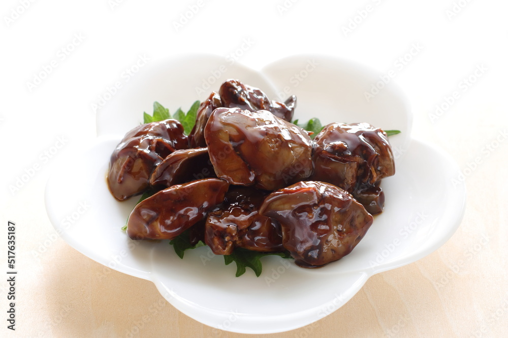 Chinese food, braised chicken livers on white dish for comfort food image Chinese food, braised chicken livers on white dish for comfort food image