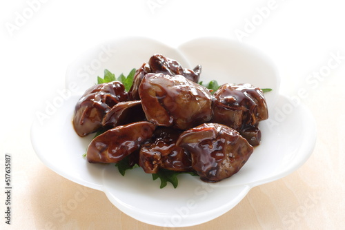 Chinese food, braised chicken livers on white dish for comfort food image