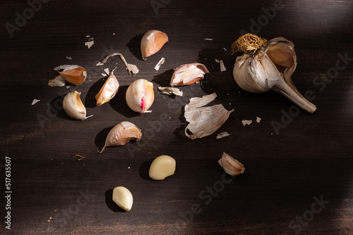 Wallpaper Mural fresh garlic on dark wooden table Torontodigital.ca