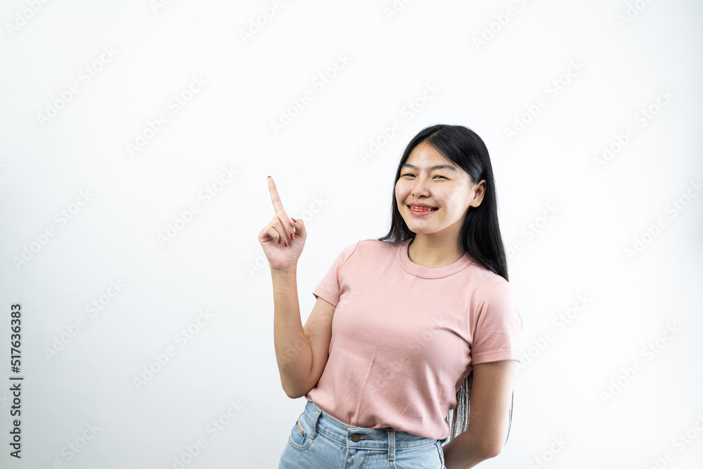 Happy Asian woman presenting or showing open hand palm with copy space for product isolated on white background Happy Asian woman presenting or showing open hand palm with copy space for product isolated on white background