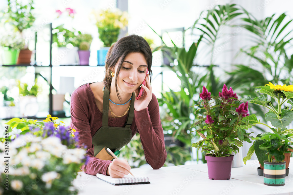 Florist taking orders over the phone Florist taking orders over the phone
