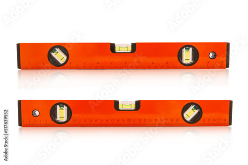 Yellow building level or water level meter with a ruler isolated on white background. Clipping path includes.