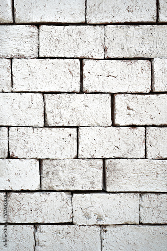 White bricks that may be part of the house's walls can be used as a background image in product advertising.