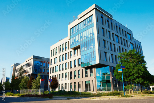 Facade of buiding with green trees, Modern office building in city for business corporation, Residential contemporary