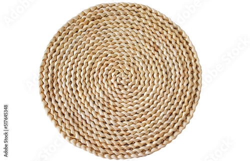 Light brown round hyacinth woven rug on insulated white background