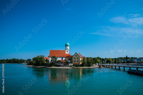 Germany, City wasserburg at lake constance, panorama view from waterside to the houses and church of the village in summertime