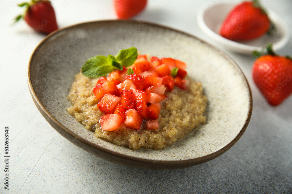 Healthy quinoa porridge with fresh strawberry Healthy quinoa porridge with fresh strawberry