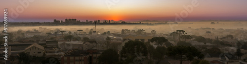 The rising sun struggling to break the morning haze © Alfonso