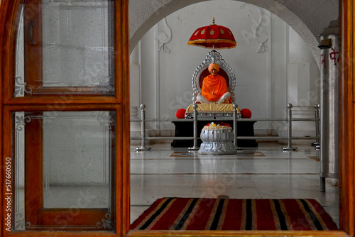 KOLHAPUR, INDIA - JULY 17, 2022: This museum showcases different aspects of Gramjivan (village life). SCULPTURE OF SWAMIJI
 photo