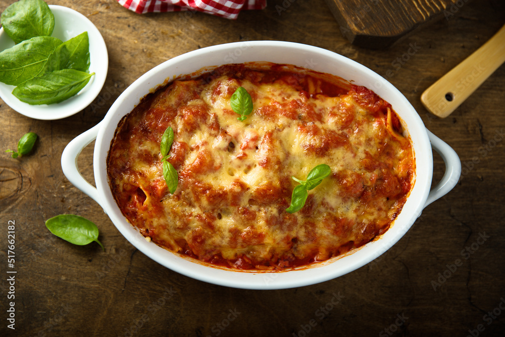 Traditional homemade lasagna with fresh basil Traditional homemade lasagna with fresh basil